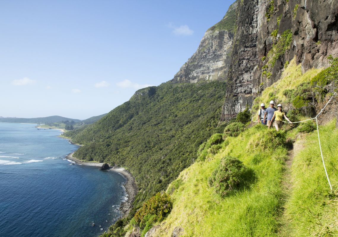 Couple enjoying a scenic hike up Mount Gower, Lord Howe Island